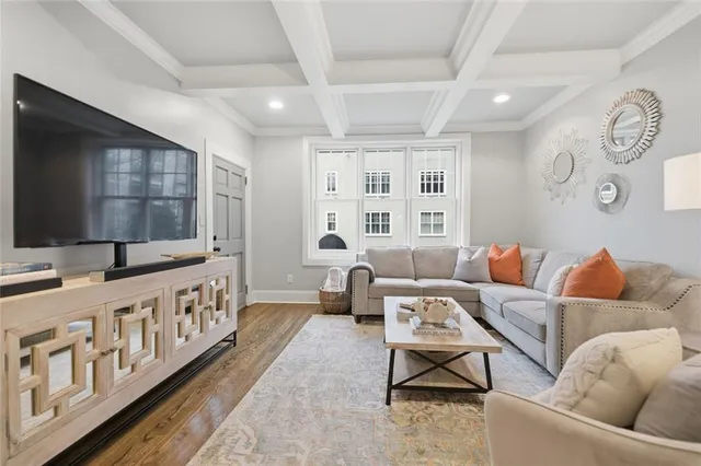a living room with furniture and window