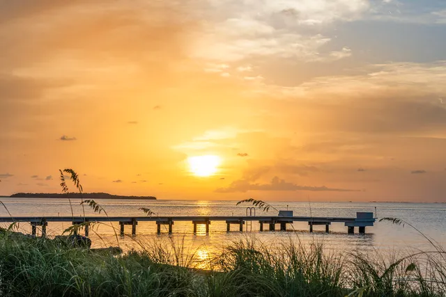 a view of swimming pool with an outdoor seating