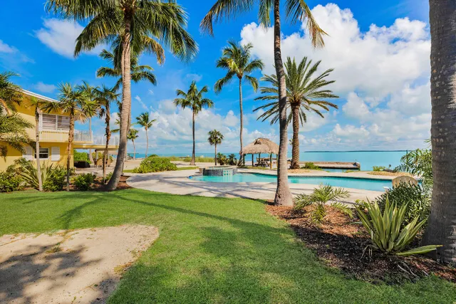 a view of a swimming pool and lake view