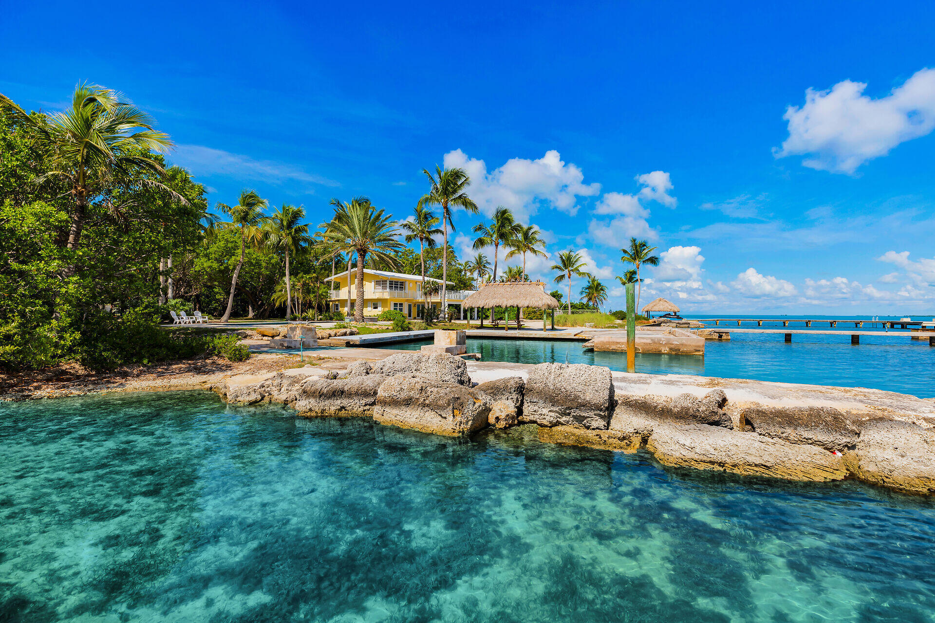 36 Sunset Road Key Largo, FL 33037 - Photo 24 of 25 a view of a garden with lawn chairs