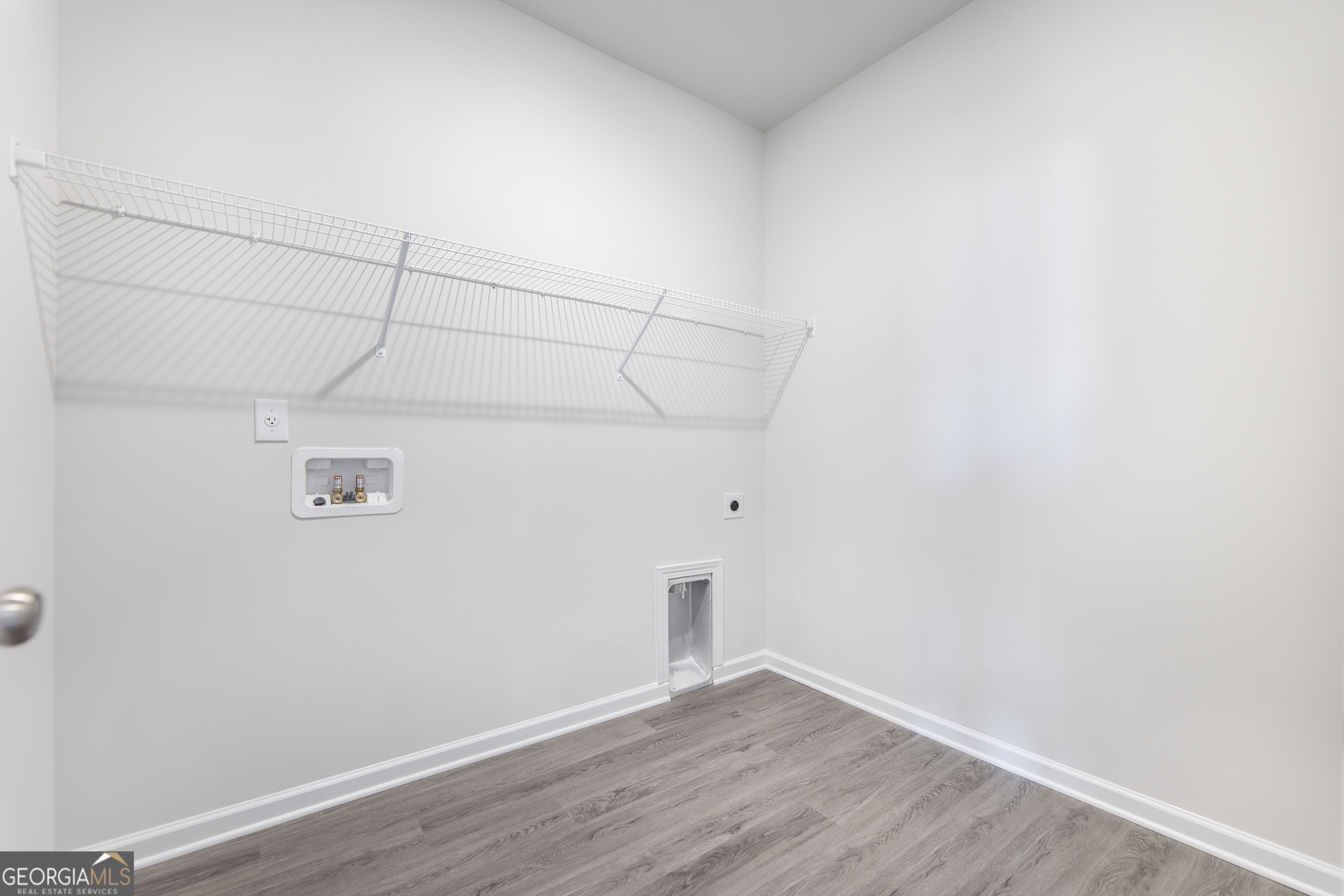 508 Georgian Walk Byron, GA 31008 - Photo 6 of 27 a view of a room with wooden floor