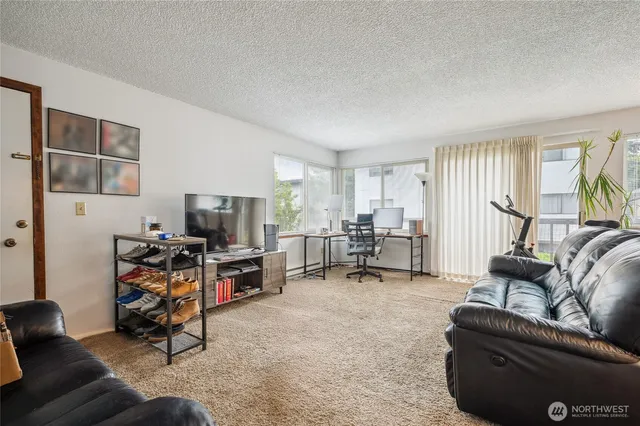 a dinning table and chairs in a room
