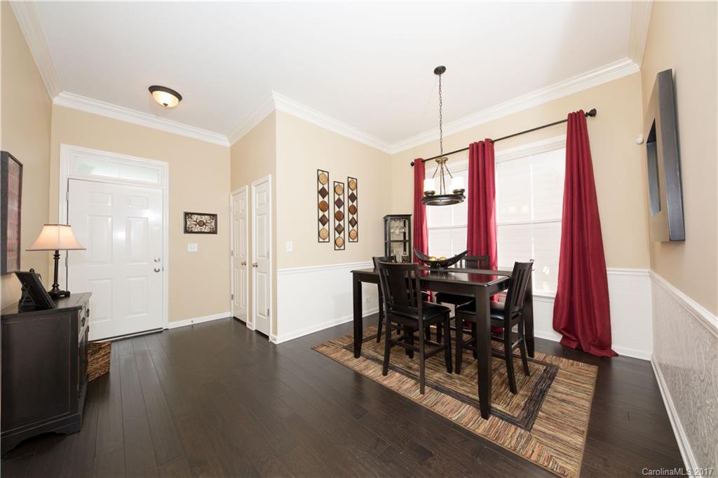 607 Caspar Way Fort Mill, SC 29708 - Photo 2 of 24 a view of a dining room with furniture window and outside view