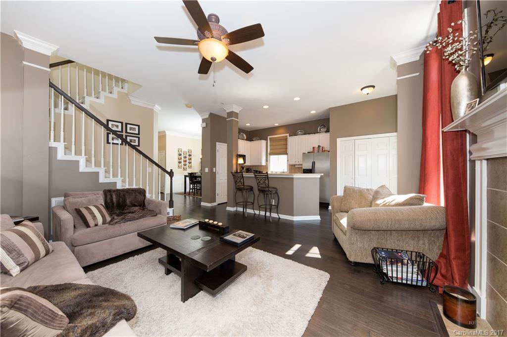 607 Caspar Way Fort Mill, SC 29708 - Photo 3 of 24 a living room with furniture and a chandelier