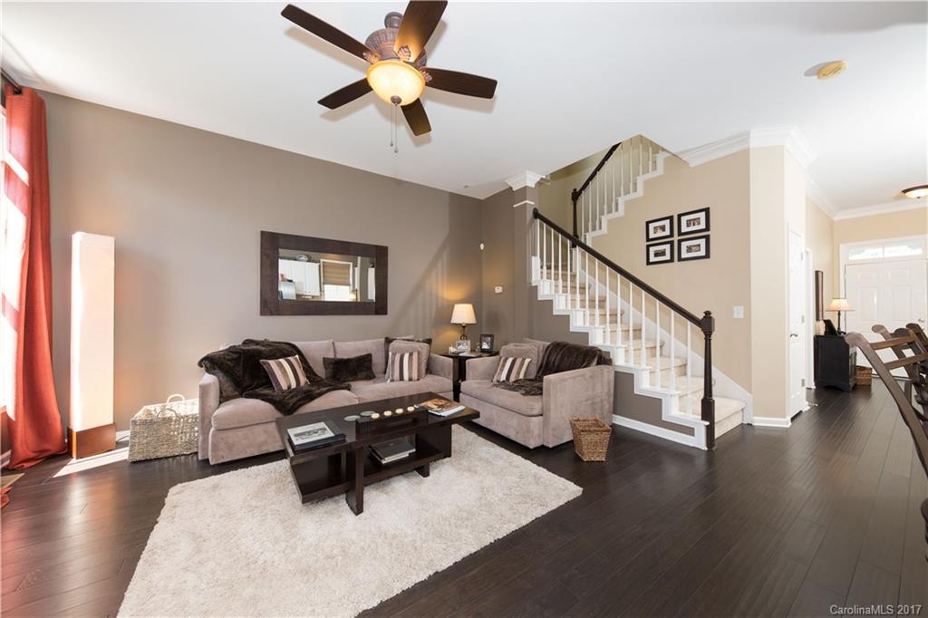 607 Caspar Way Fort Mill, SC 29708 - Photo 4 of 24 a living room with furniture and a ceiling fan