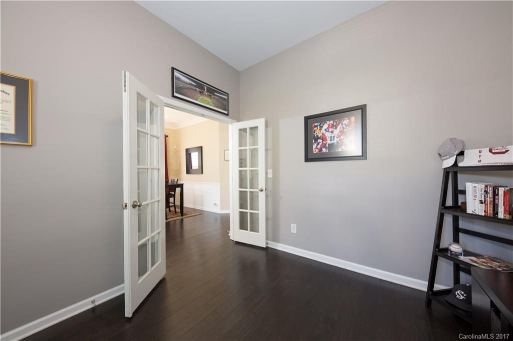 607 Caspar Way Fort Mill, SC 29708 - Photo 10 of 24 a view of a hallway with workspace and a window