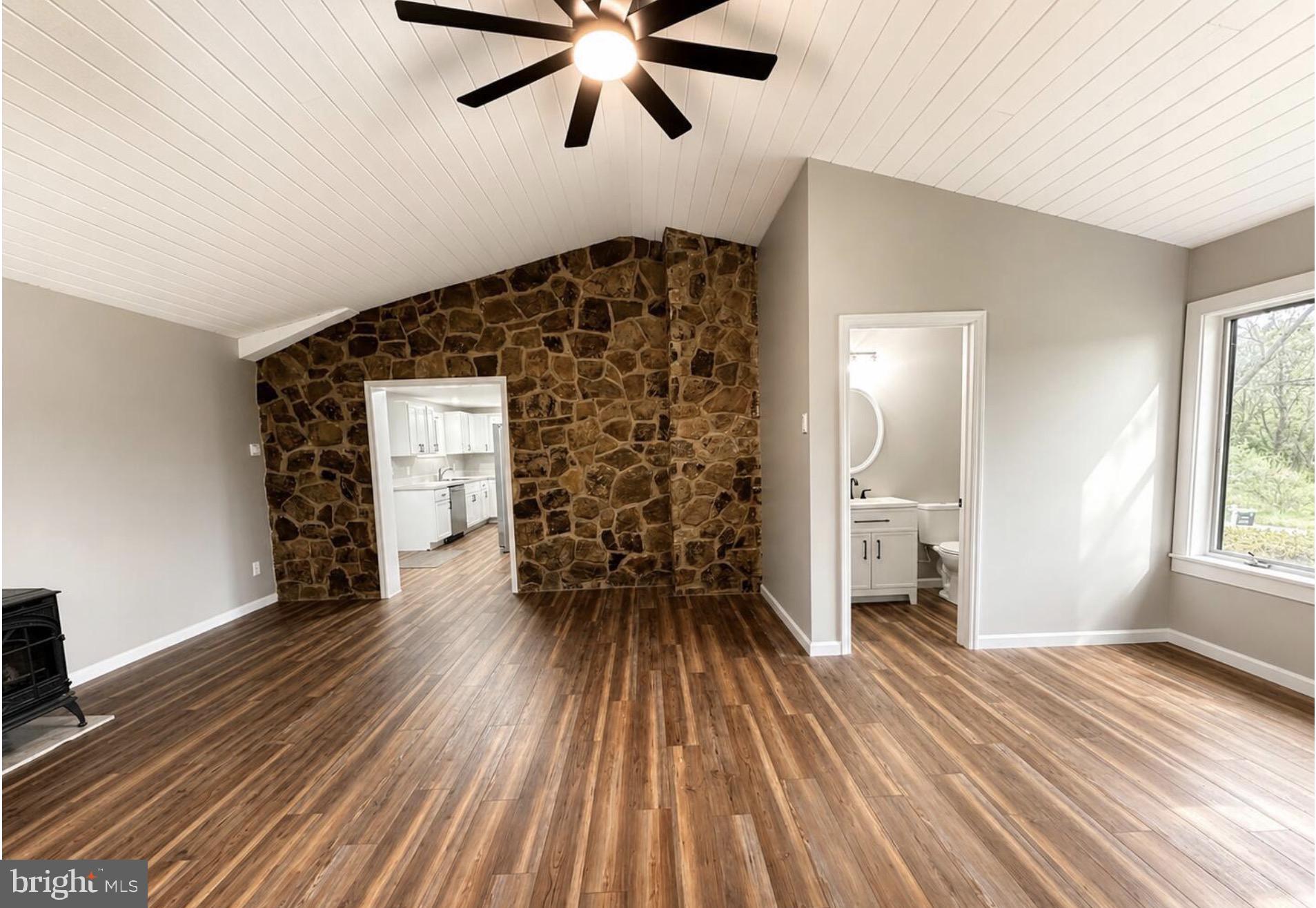 4805 Buffalo Run Road Port Matilda, PA 16870 - Photo 10 of 29 Spacious living area with rustic charm.