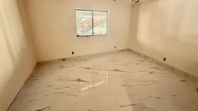 an empty room with a window