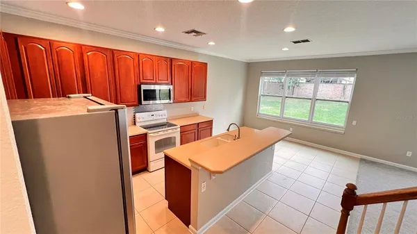 a kitchen that has a sink in it
