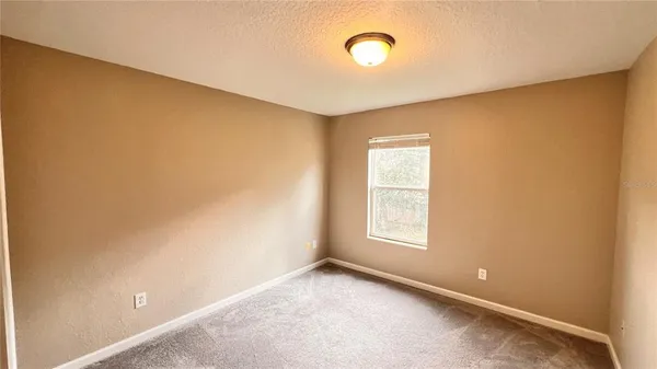 an empty room with closet