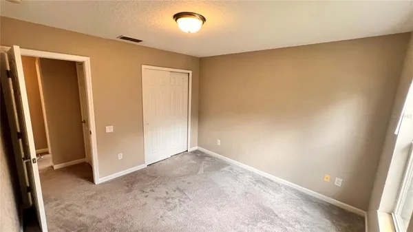 a spacious bathroom with a bathtub sink and toilet