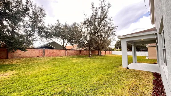 a house view with a garden space