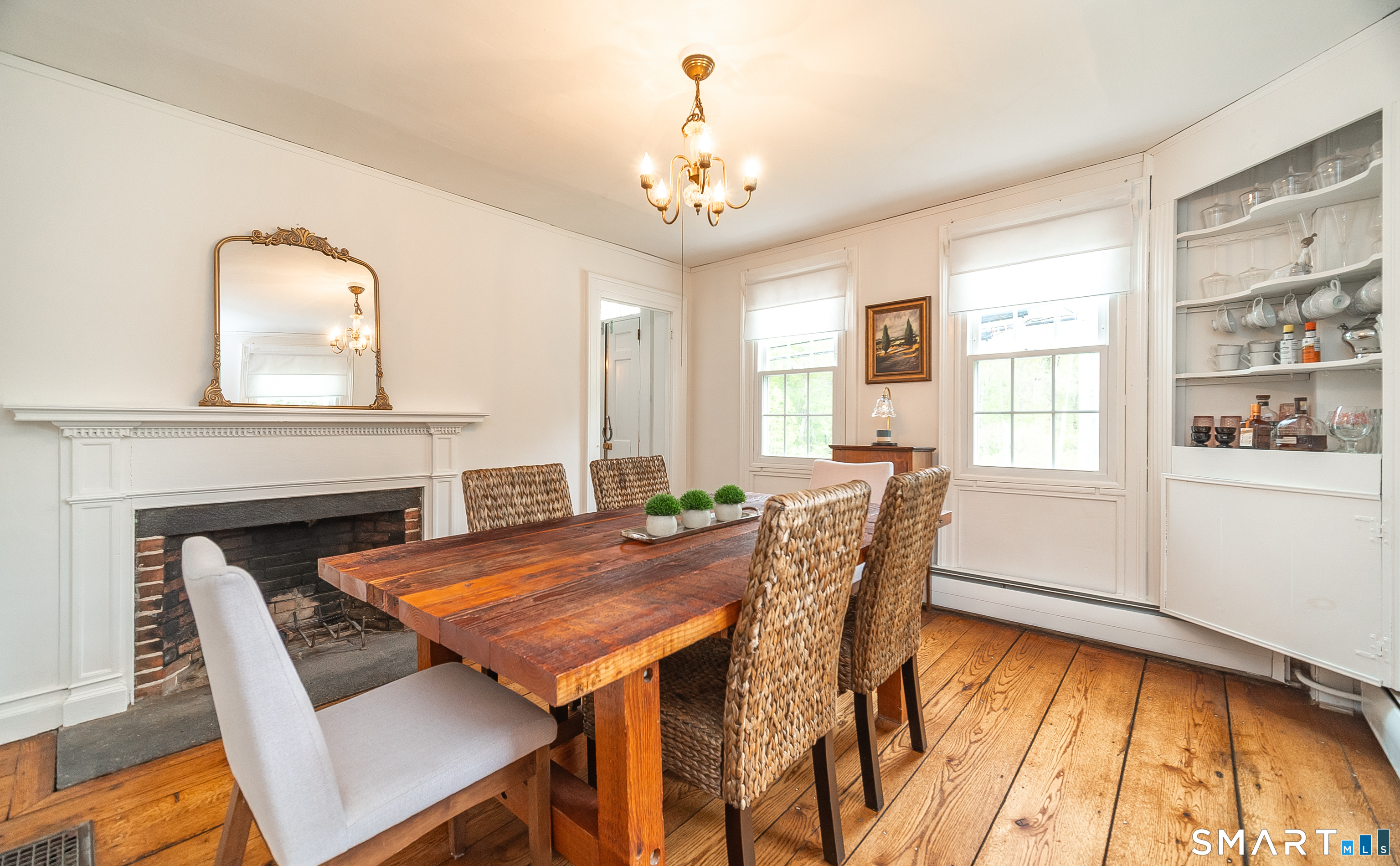 230 Killingworth Road Haddam, CT 06441 - Photo 15 of 36 a view of a dining room with furniture window and wooden floor