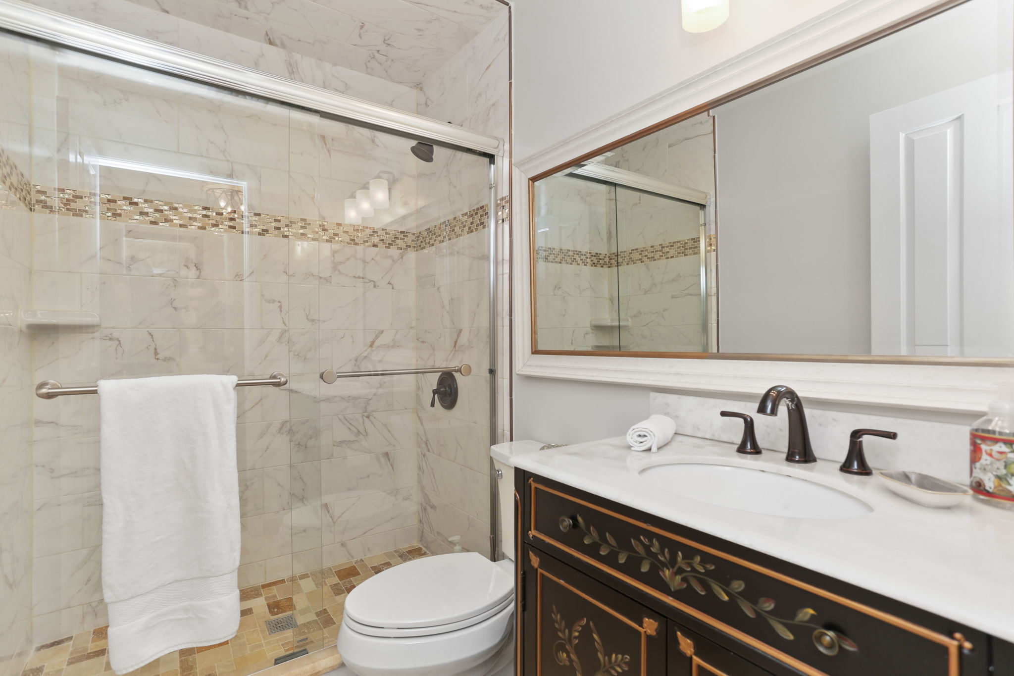 376 Knapps Highway, Unit 376 Fairfield, CT 06825 - Photo 14 of 22 a bathroom with a sink a toilet and shower