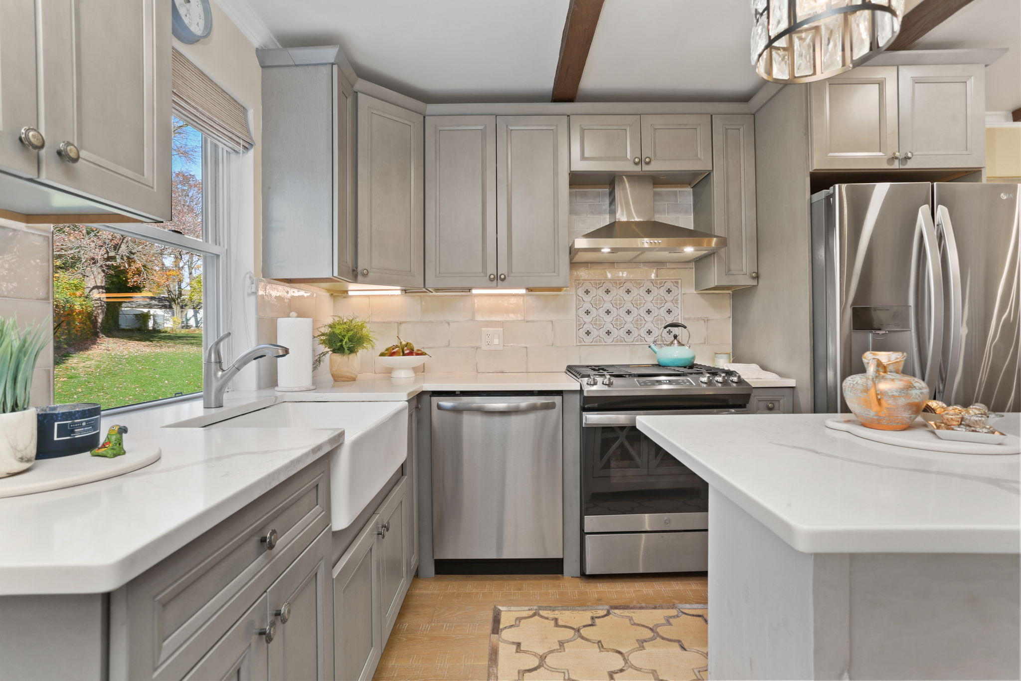 376 Knapps Highway, Unit 376 Fairfield, CT 06825 - Photo 3 of 22 a kitchen with stainless steel appliances a sink stove and refrigerator