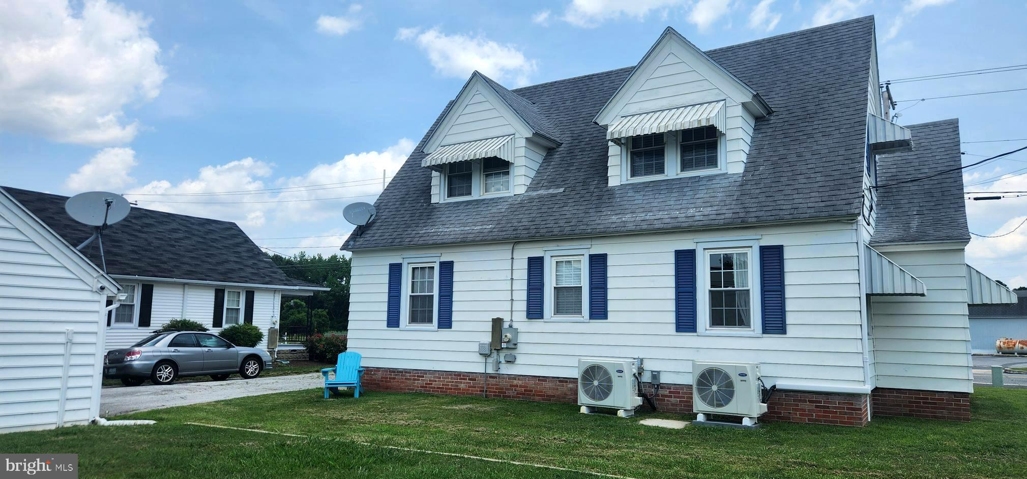 2001 Rhodesdale Vienna Vienna, MD 21869 - Photo 11 of 39 a front view of house with yard and outdoor seating