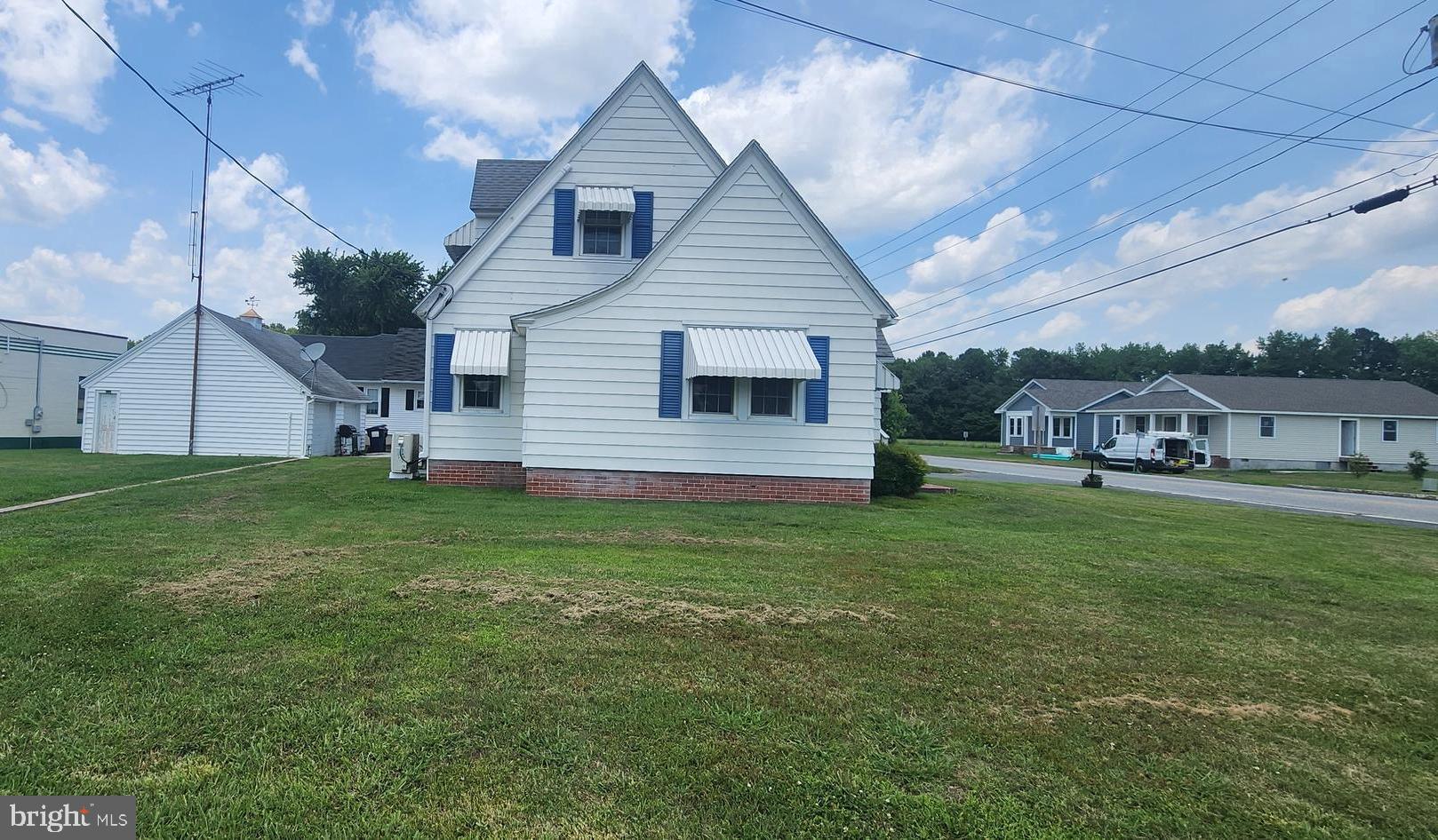 2001 Rhodesdale Vienna Vienna, MD 21869 - Photo 12 of 39 a front view of house with yard and green space