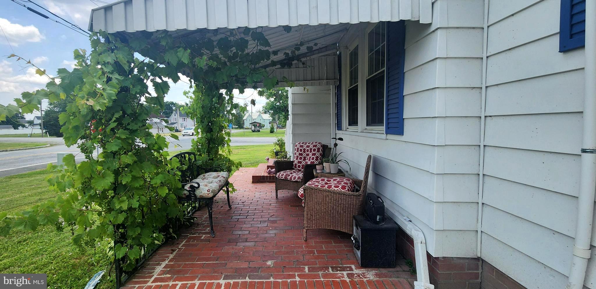2001 Rhodesdale Vienna Vienna, MD 21869 - Photo 13 of 39 a view of a patio with chairs and potted plants