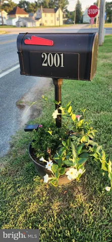 a sign that is sitting in the grass