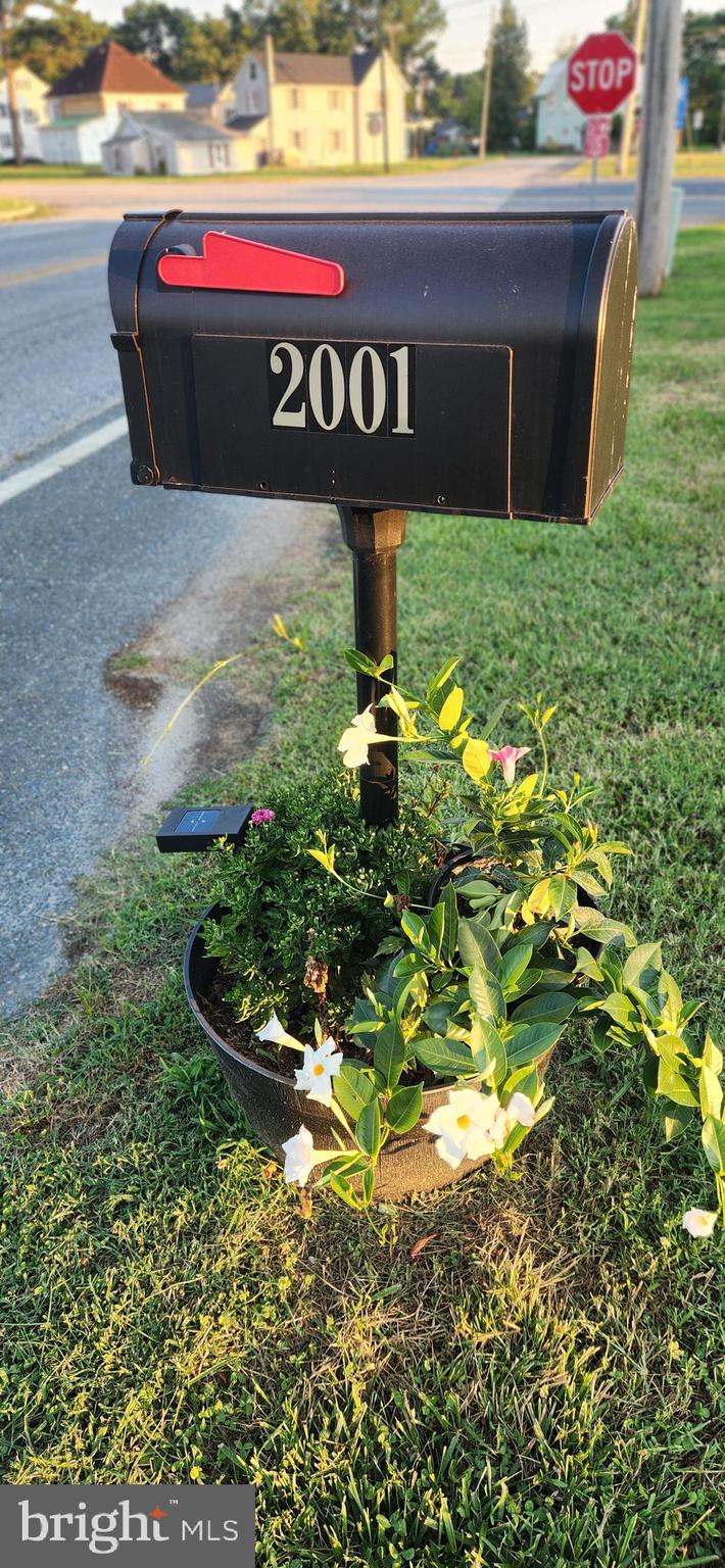 2001 Rhodesdale Vienna Vienna, MD 21869 - Photo 2 of 39 a sign that is sitting in the grass