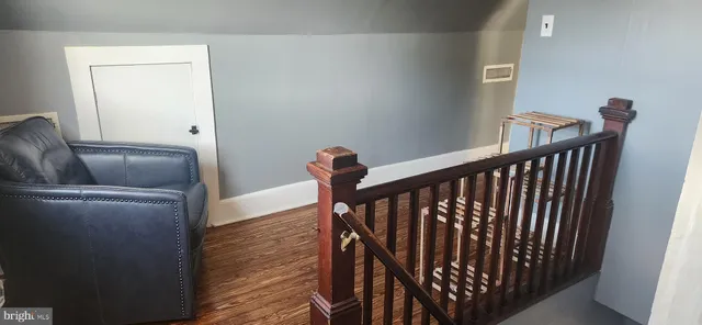 a view of entryway with wooden floor