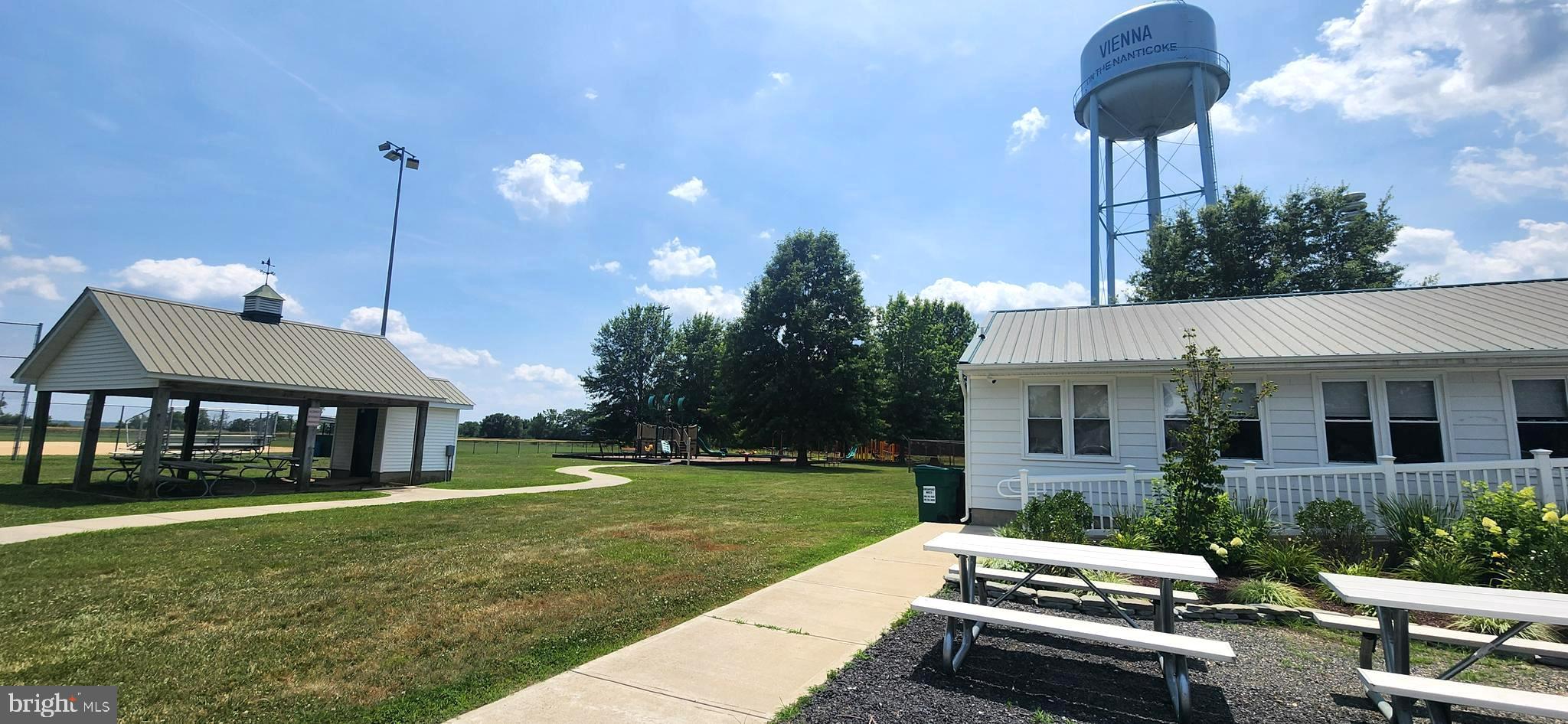 2001 Rhodesdale Vienna Vienna, MD 21869 - Photo 34 of 39 a view of a house with backyard porch and sitting area