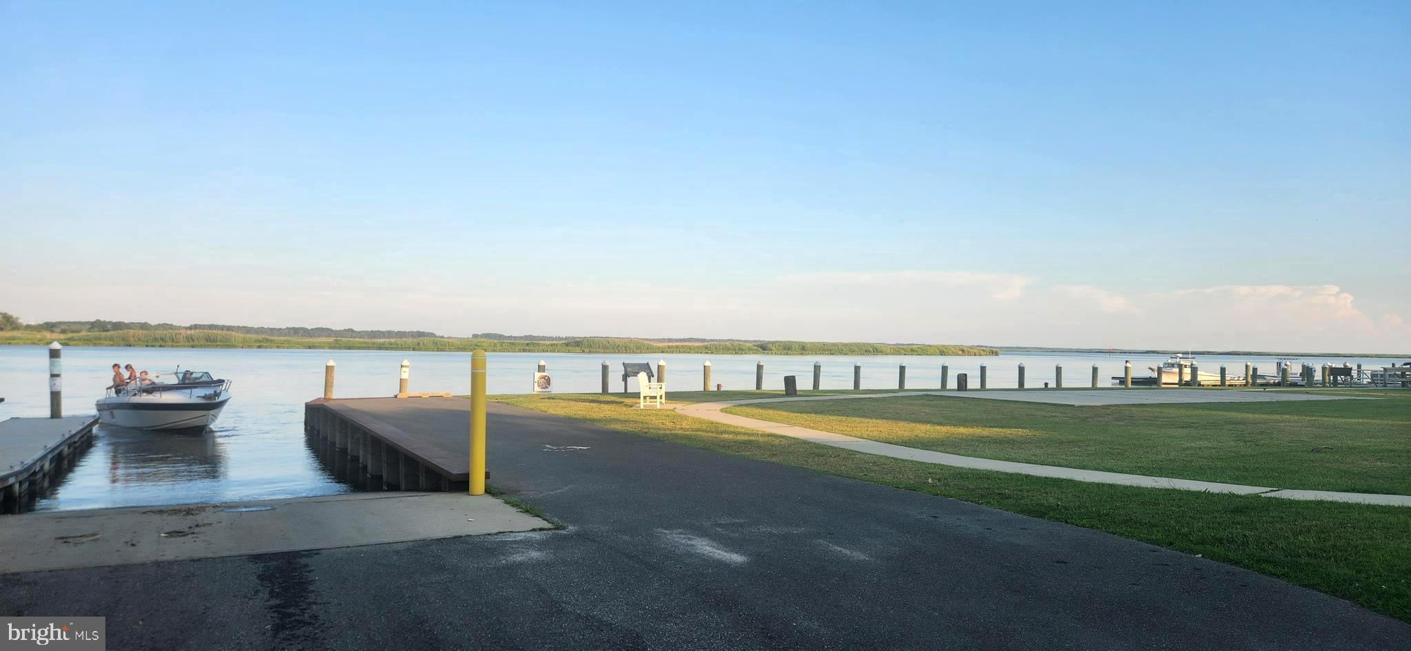 2001 Rhodesdale Vienna Vienna, MD 21869 - Photo 36 of 39 a view of a swimming pool with a terrace and seating space