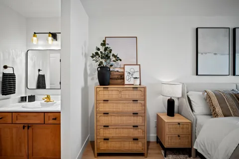 a bedroom with a bed and furniture