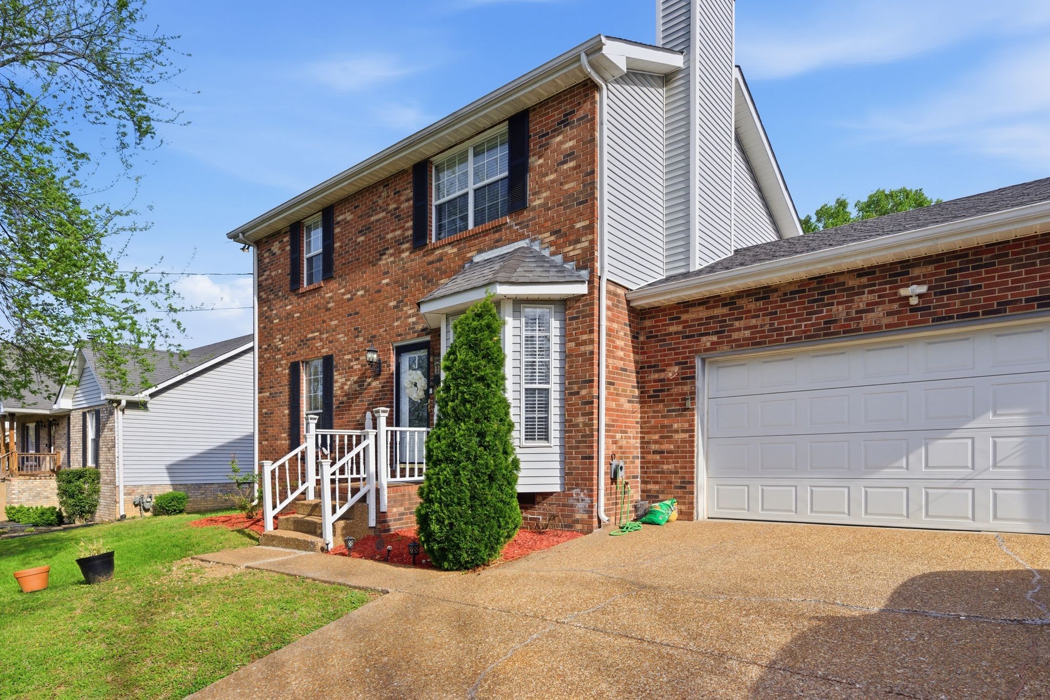 1140 Campbell Road Goodlettsville, TN 37072 - Photo 1 of 33 a front view of a house with garden