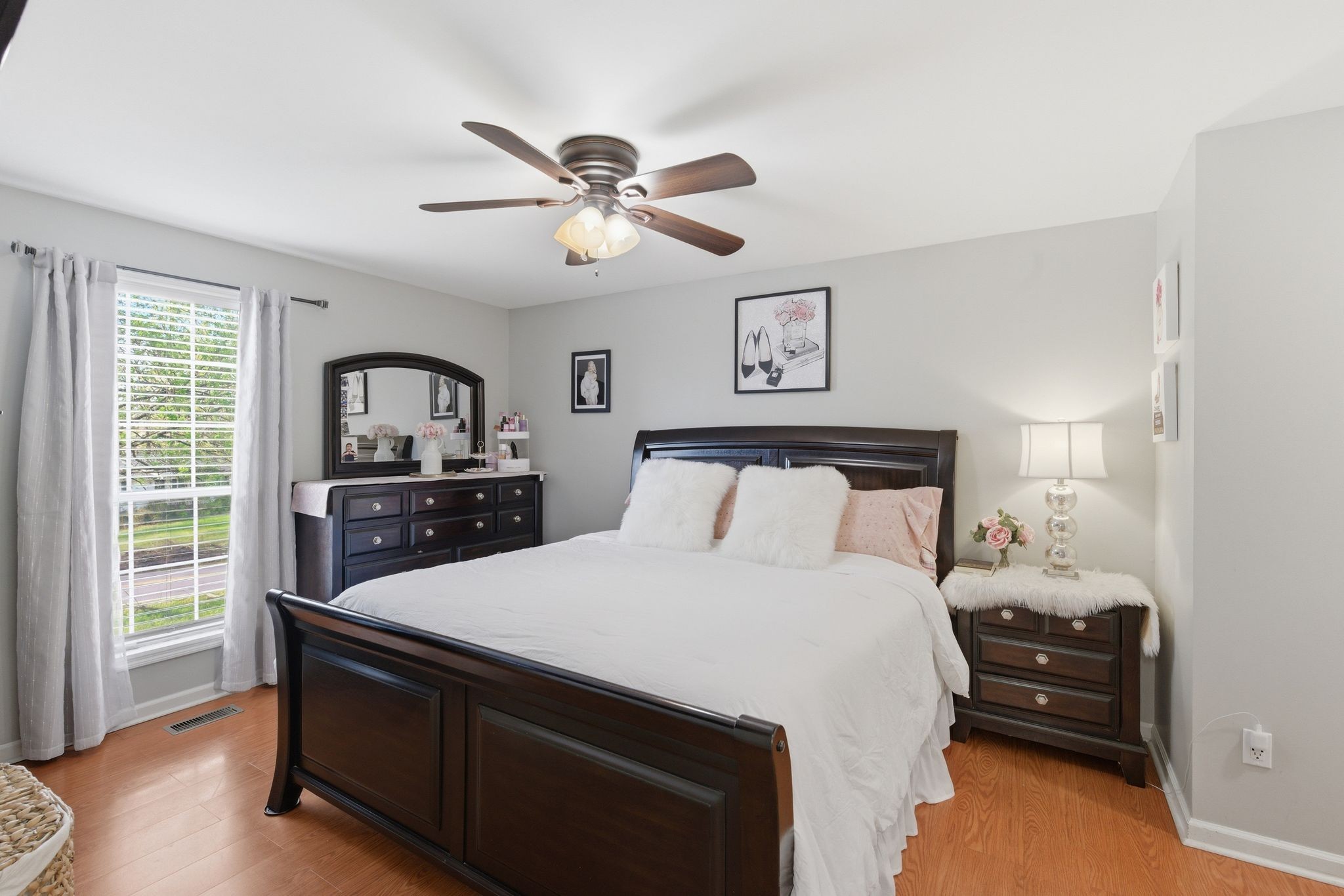 1140 Campbell Road Goodlettsville, TN 37072 - Photo 14 of 33 a bedroom with a bed and a chandelier