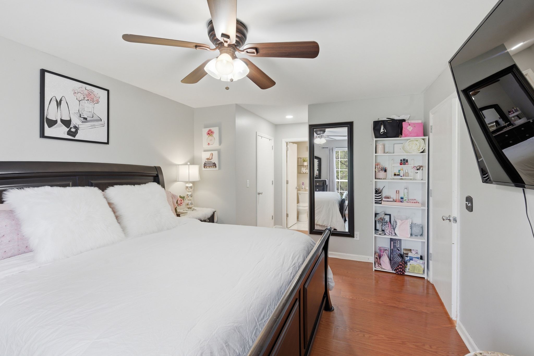 1140 Campbell Road Goodlettsville, TN 37072 - Photo 16 of 33 a bedroom with a large bed and a flat tv screen