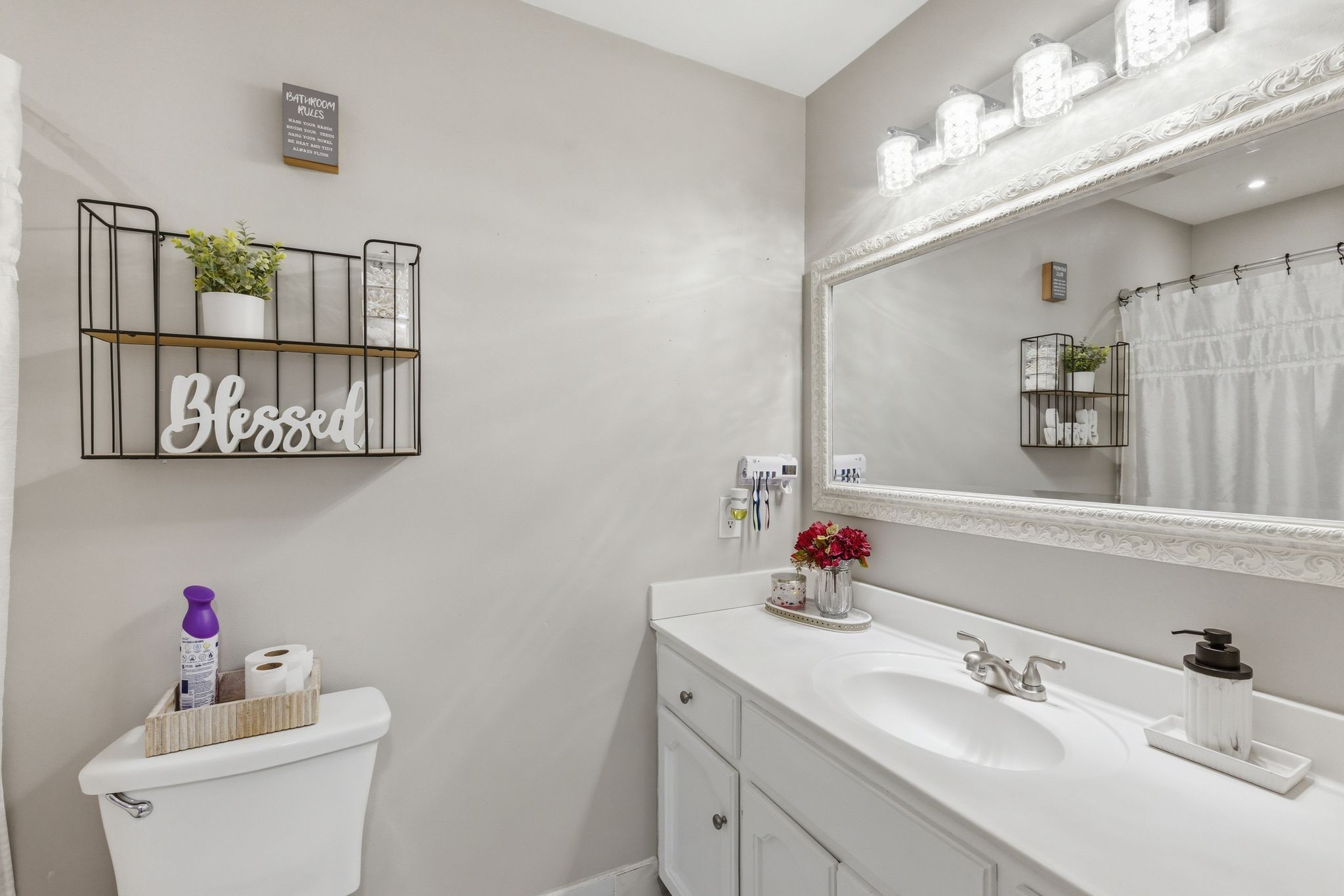 1140 Campbell Road Goodlettsville, TN 37072 - Photo 17 of 33 a bathroom with a sink and a mirror