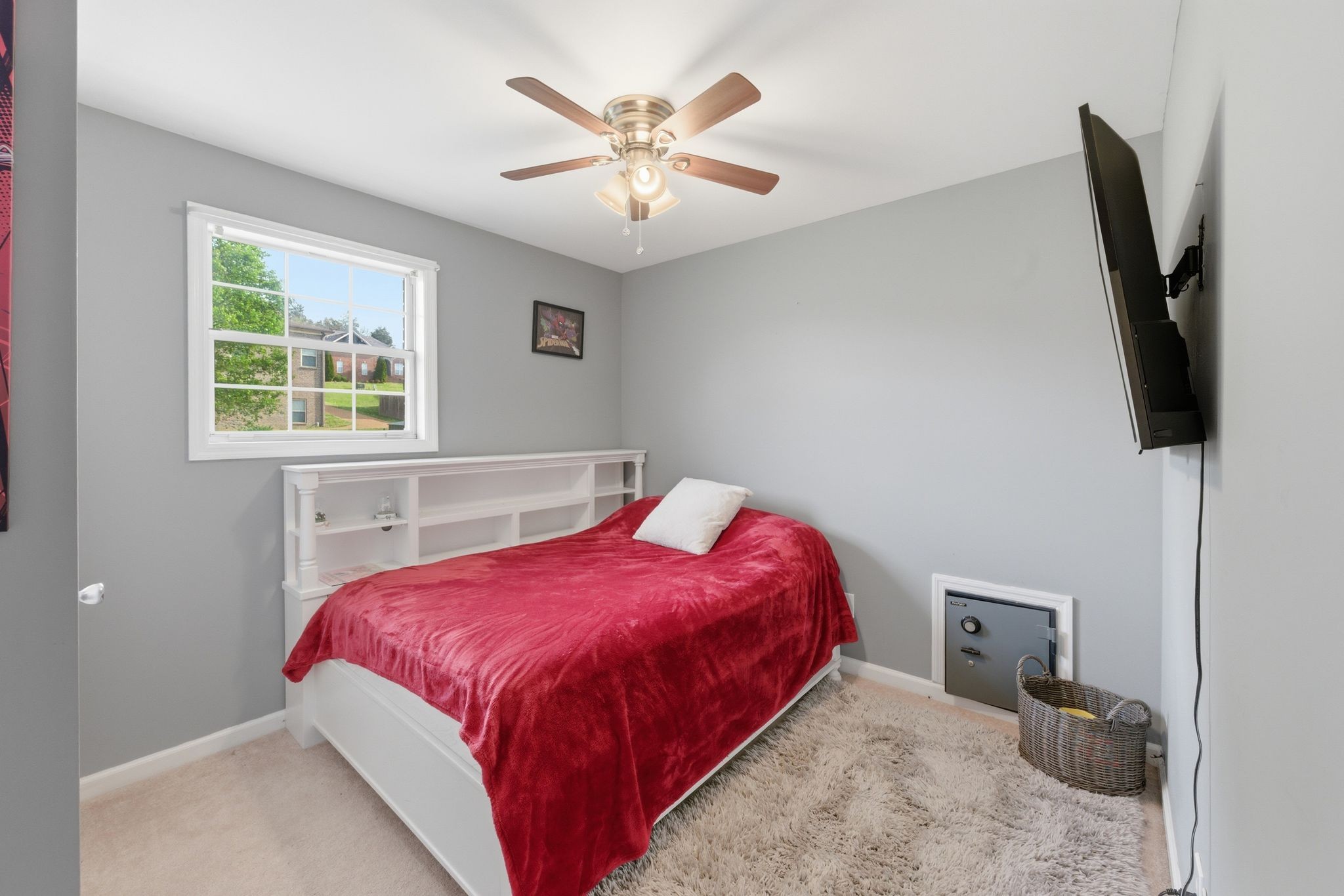 1140 Campbell Road Goodlettsville, TN 37072 - Photo 25 of 33 a bedroom with a bed and a flat screen tv