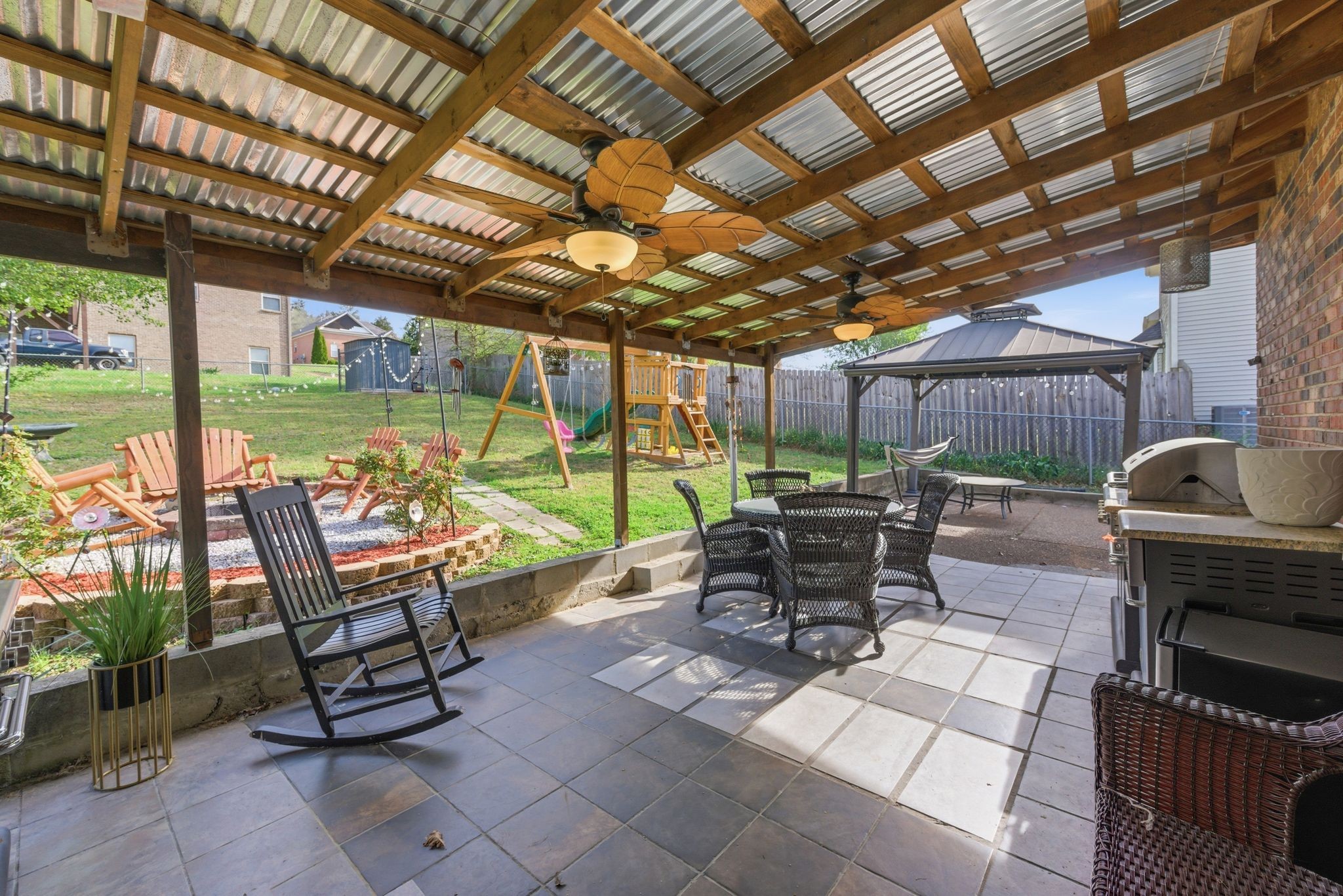 1140 Campbell Road Goodlettsville, TN 37072 - Photo 27 of 33 a view of a chairs and table in backyard