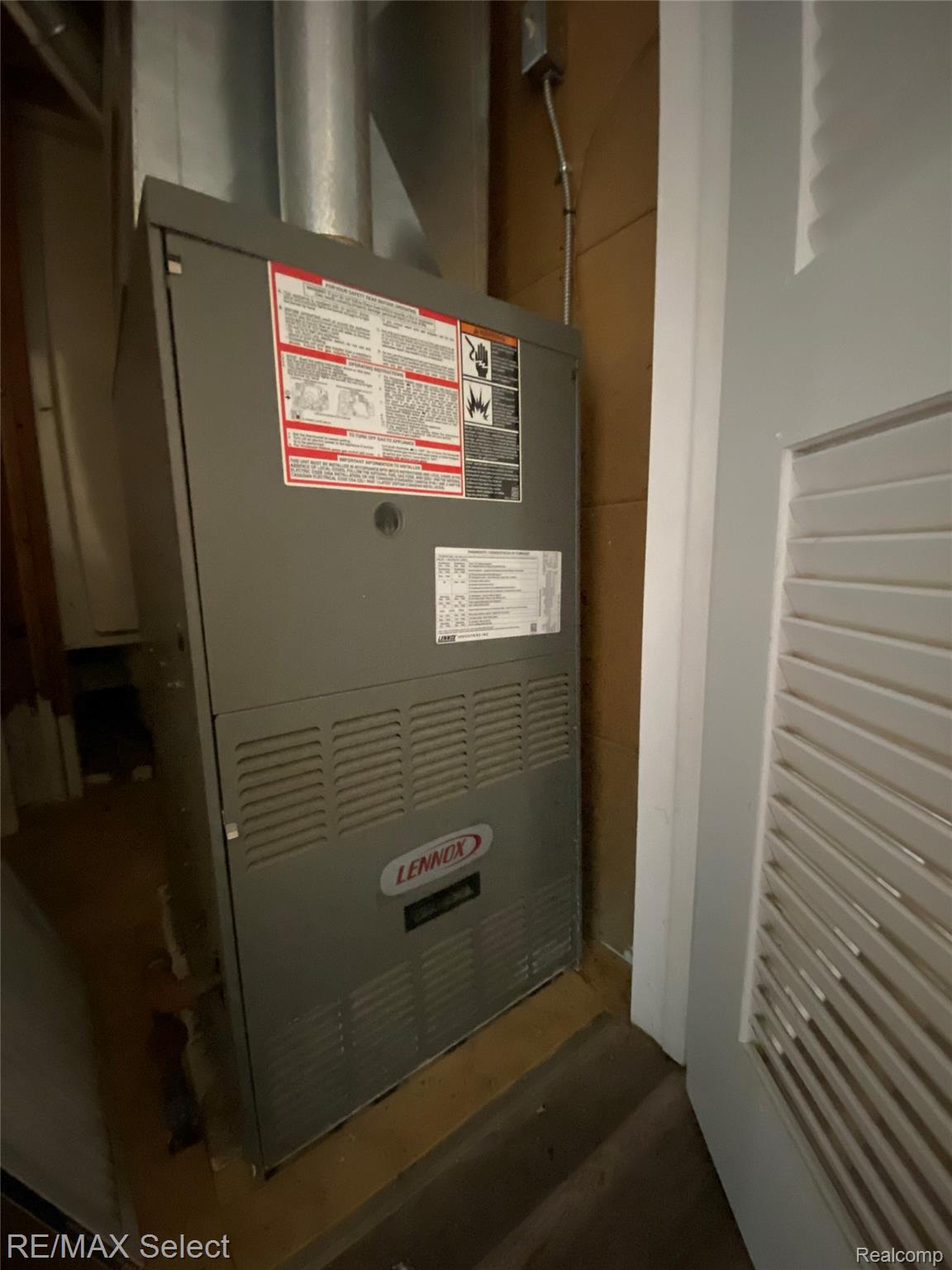 6169 Johnson Road Flushing, MI 48433 - Photo 14 of 28 Utilities featuring heating unit