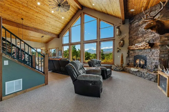 a view of a patio with a table and chairs