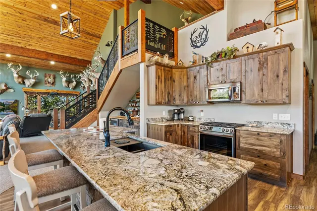 a kitchen with a sink and wooden cabinets