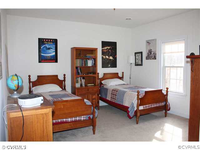 4018 Bircham Loop Midlothian, VA 23113 - Photo 10 of 12 a bedroom with two beds and painting on the wall