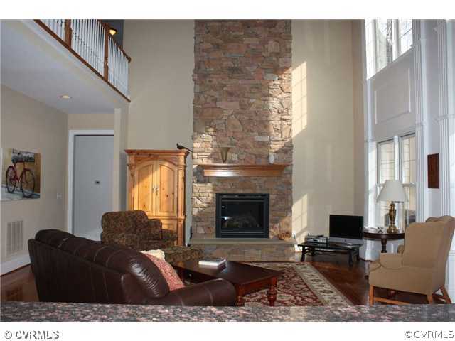 4018 Bircham Loop Midlothian, VA 23113 - Photo 2 of 12 a living room with furniture and a fireplace