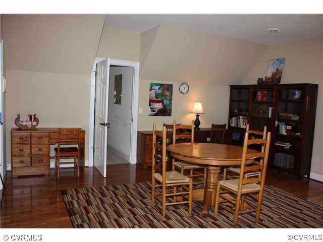 4018 Bircham Loop Midlothian, VA 23113 - Photo 12 of 12 a dining room with furniture and wooden floor