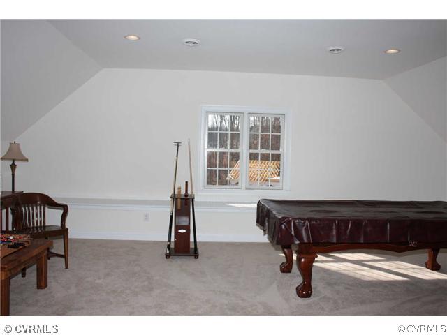 4018 Bircham Loop Midlothian, VA 23113 - Photo 9 of 12 a room with furniture and a window