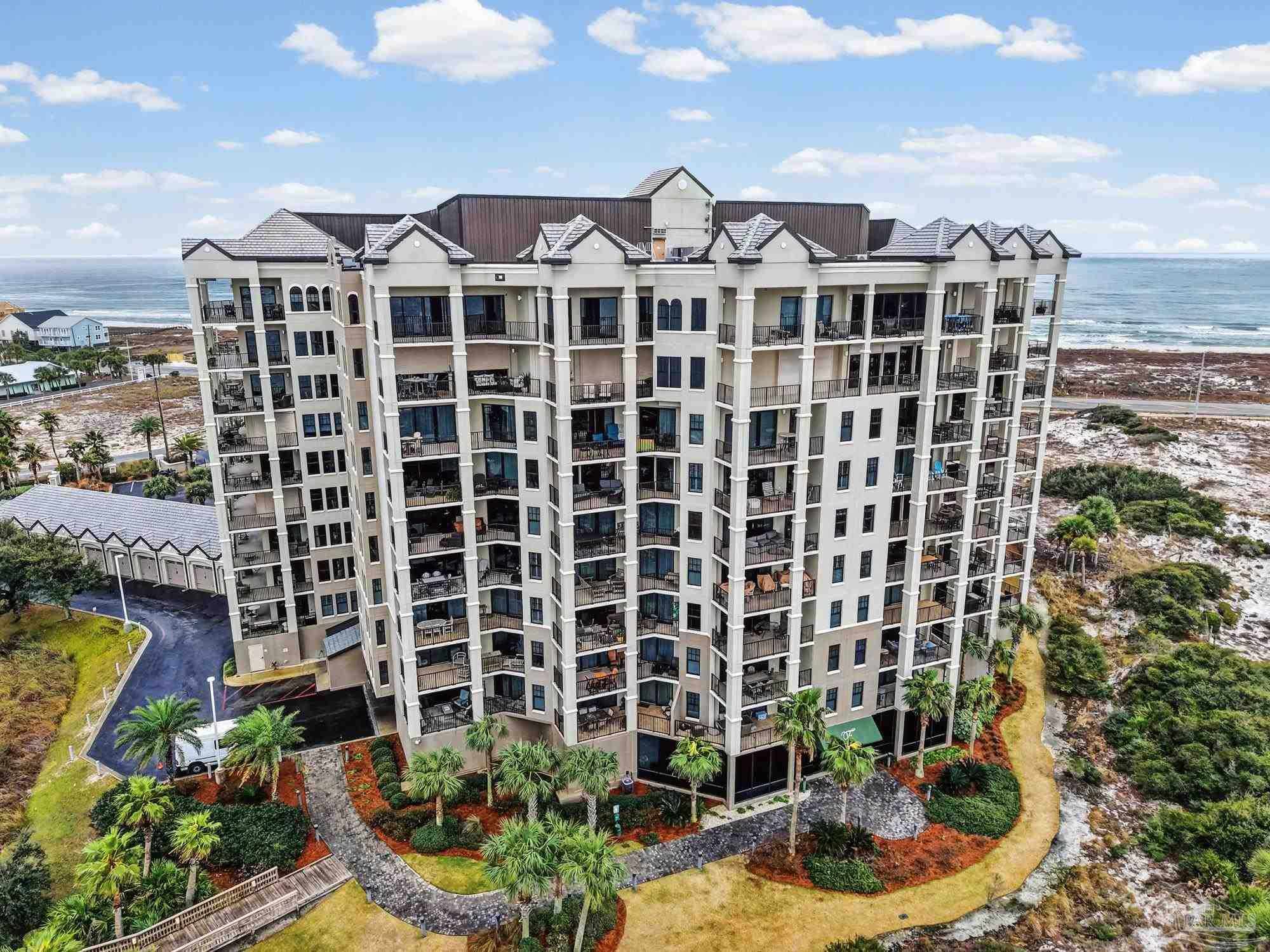 14900 River Road, Unit 904 Perdido Key, FL 32507 - Photo 61 of 62 a view of a building with garden space and windows