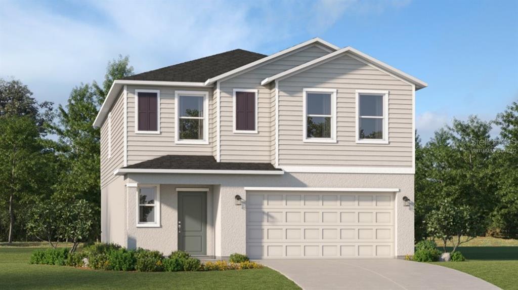 2811 Whitaker Point Road Haines City, FL 33844 - Photo 1 of 1 a front view of a house with garden