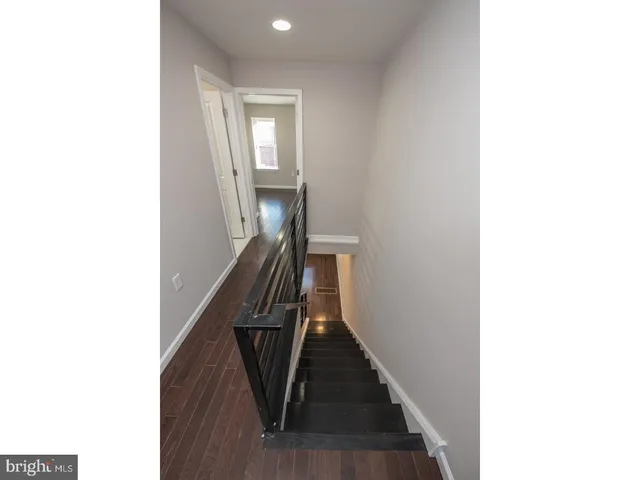 a view of a hallway with entryway