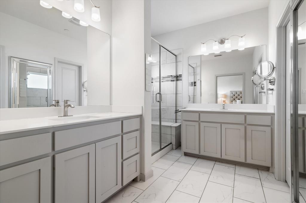 7919 Canal Street Frisco, TX 75034 - Photo 21 of 36 a spacious bathroom with a double vanity sink mirror and