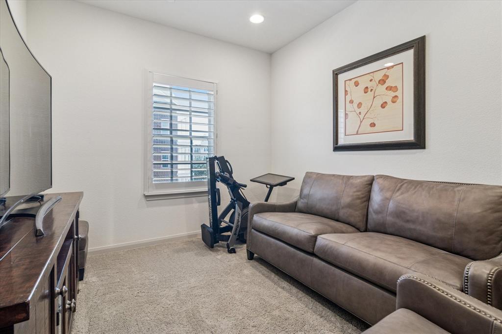 7919 Canal Street Frisco, TX 75034 - Photo 28 of 36 a living room with furniture and a window