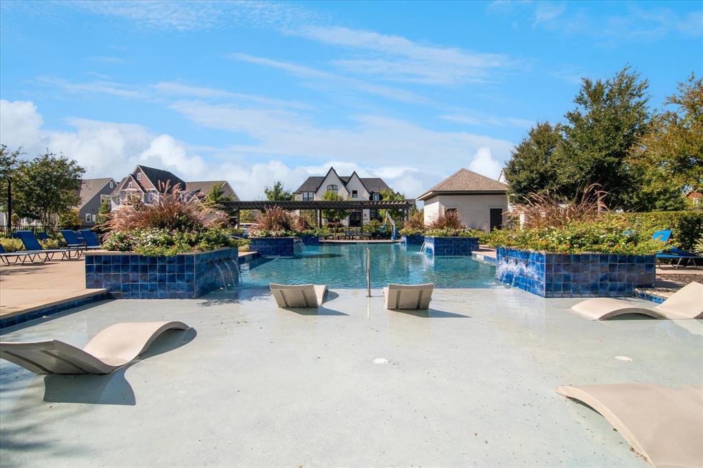 7919 Canal Street Frisco, TX 75034 - Photo 33 of 36 a view of a terrace with a bench
