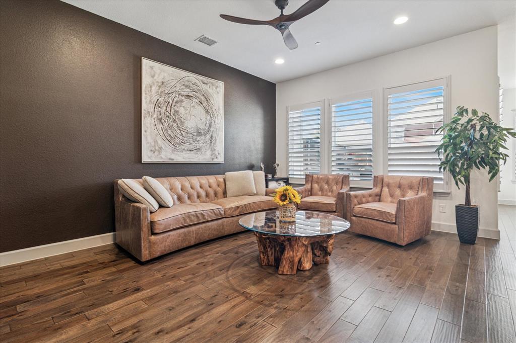 7919 Canal Street Frisco, TX 75034 - Photo 7 of 36 a living room with furniture and a large window