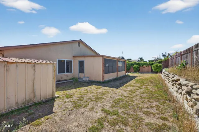 a view of backyard of house
