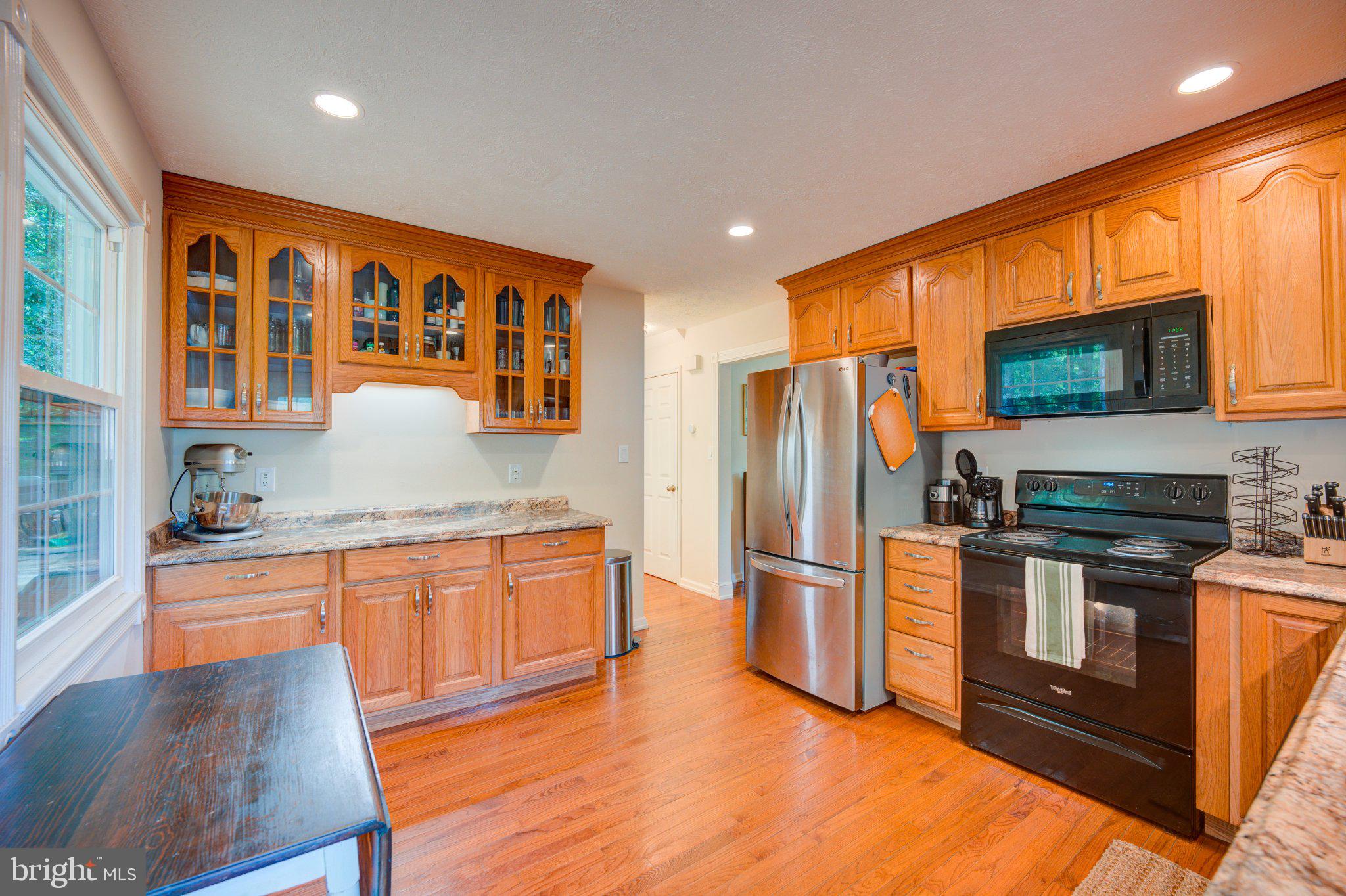 9595 Roys Lane Culpeper, VA 22701 - Photo 8 of 61 Charming kitchen with warm wood accents.